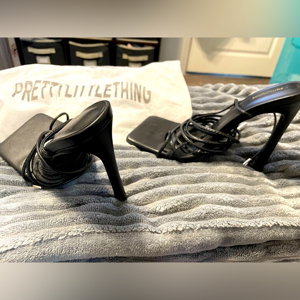 Pretty Little Thing black high heels.